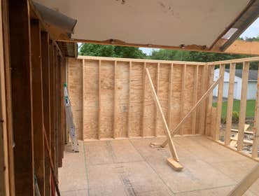 Photos by C.S Remodeling & Construction #1 Dust protection and entry to home protection temporary wall built to prevent anyone or anything from getting