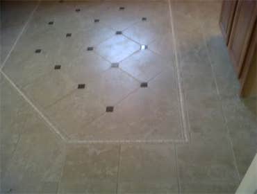 Porcelain with stone border and insets