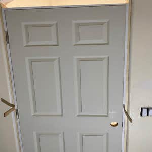 Photos by Rogue Contractors LLC #1 Customer wanted a door installed into a existing bathroom opening.