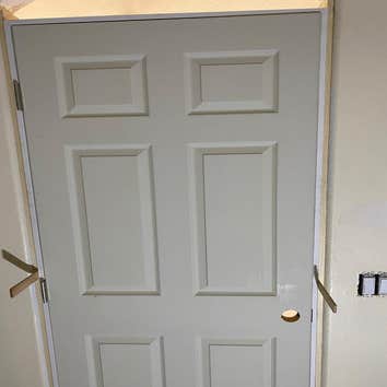 Photos by Rogue Contractors LLC #1 Customer wanted a door installed into a existing bathroom opening.