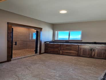 Photos by Wethered Timberworks LLC Dba Wethered Construction #1 Custom Home