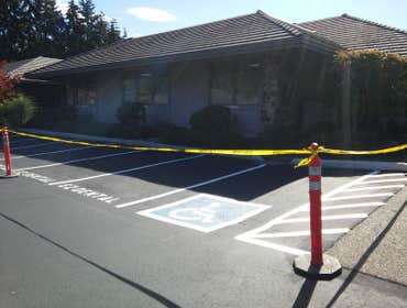 Bellevue Office Park Seal/Stripe Repaired parking lot curbing, filled all cracks in asphalt, 2 coats of Sealcoat and Lot striping with personalized par