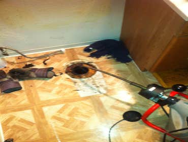 Colorado springs clogged mainline This mainline clog had to been run by removing basements bathroom toilet to clear the drain clog.