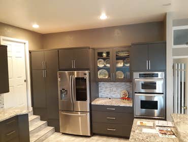 Photos by Maltas Construction #6 Kitchen remodel. Complete demo and replace. Floors, some drywall, cabinets, countertops, appliances, backsplash,