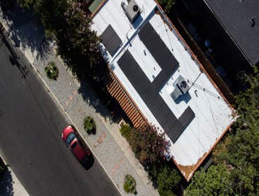 Flat Roofing and Solar Panel System Installation in LA The AMECO team took care of the customer's roofing and solar needs being a one-stop shop for qua