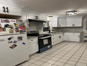 Photos by Monumental Construction #9 We transformed this outdated Kitchen, to a modern, clean and durable new Kitchen.