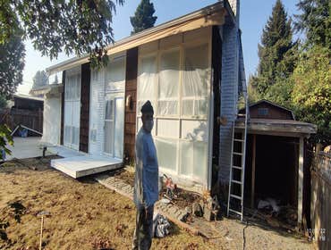 Saul's Quality Painting LLC Project #1 Initially Just a repainting of the home, later the client asked to add the painting of the deck to the job agree