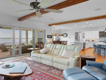 Bells River Residence Nestled in the serene Waterman’s Bluff in Yulee, FL, this exquisite home offers 3,046 sq ft of living space, expanding to a total