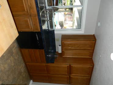 Photos by ZV Construction #2 Complete kitchen and laundry remodel,
Including flooring in mail living areas.
Before and after kitchen pictures.