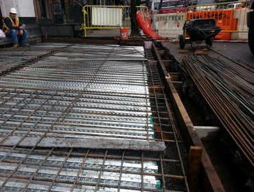 SEBCO DEVELOPMENT Scope of work: Vault and sidewalk replacement, brick pointing, new parapet wall and roofing.