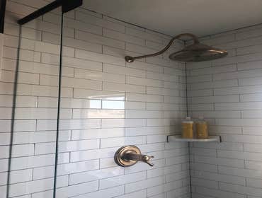 Subway shower tile/ custom shower/ Delta faucets/ shepherd hook rain shower