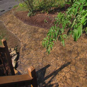 Project photos from Williamson Construction 8 block foundations and brick casements of Oakhurst Homes
radom fieldstone pattern stamped concrete...