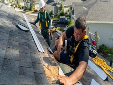 Photos by Flagstone Roofing and Exteriors #1