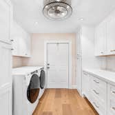 Transforming Spaces ✨? Outdated laundry room into a beautiful, functional space!