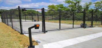 Loomis Armored Security Rio Grande Fence Company was chosen to install black vinyl chain link fencing around the perimeter of Loomis Armored Security 