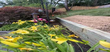 Landscaping & Hardscaping Cleaning weeds, trimming, apply new mulch and edging using pavers, hardscaping, French drains