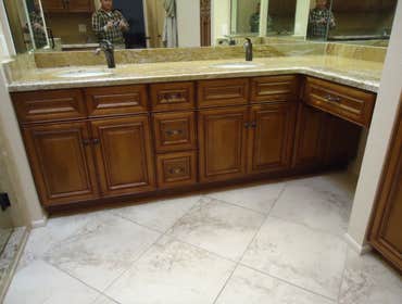 Project photos from Cadillac Tile Company L L C Here we have a good example of before[left side] and after photos, This is just a very small sample of 