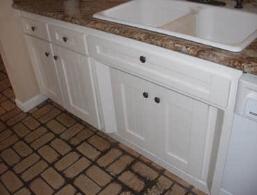 Bonnie's House These are some cabinets we built and refaced to match. We also built a custom bookcase in a room off of the kitchen. and we built the c