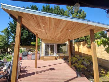 Photos by Stewart & Son Gate & Fence LLC #1 Tiny House with pergola. Small house 17' by 12' small bathroom with pocket door, and small sink with water 