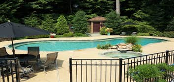 Photos from Crystal Blue Aquatics Llc New Construction of pool with full automation, LED lighting, high end travertine patio decking, beautiful water f