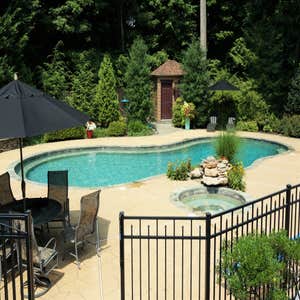 Photos from Crystal Blue Aquatics Llc New Construction of pool with full automation, LED lighting, high end travertine patio decking, beautiful...