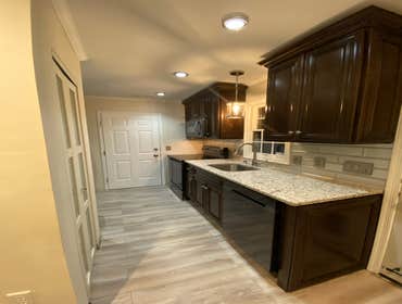 Photos by Saviors Custom Carpentry, Inc #1 Composite steps, vinyl railings & 1x4 azek