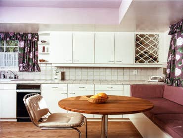 1982: Bench Seat Basics Kitchen & Bath This kitchen and bath remodel included a small 21″ extension of the kitchen under the existing eave to make room