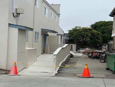Photos by Santiago's Bay Builders Inc #1 Remodeling half of the building