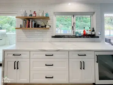 Thousand Oaks Kitchen Remodel We transformed this Thousand Oaks kitchen into your modern, open-concept haven! Picture white cabinets with black handles