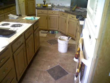 Othello Kitchen Granite/Porcelain Tile Work Kitchen Countertops and Backsplash done in Granite tile with hand beveled and polished edges and floors don