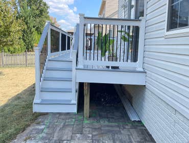 New Build: Trex Enhanced Decking with White Vinyl Railing New deck build with Trex Enhanced decking boards and Vinyl railing with black round aluminum 