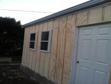 Photos by Steve Burnsed General Contracting #8 Poured ramp slab built double doors and installed door and 3windows closed in with T111 so customer had 