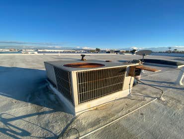 Photos by Airsun Solution Inc #1 2 carrier RTU Replacement
