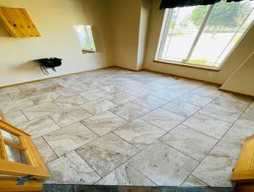 Tile Kent, Wa We were working removing the carpet, take out the baseboard, install tile and reinstall the baseboard.
