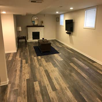 Basement by Best Fit Homes Inc Finishing a basement with adding a bedroom.
