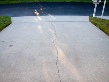Jhm Construction Llc Project Drive Replacement - Before and After. JHM also applied a curing compound to help maximize the concrete strength for greate