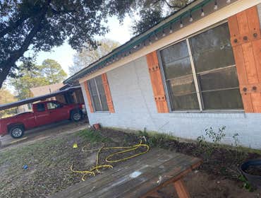 Photos by Handy Express #1 Replace siding on the side of a 2 story home
