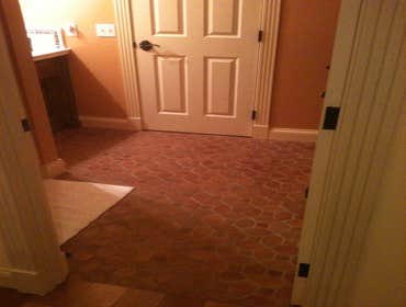J C M Construction Project Installation of all new wood flooring and tile throughout house. Installation of fireplace tile, new kitchen counter tops, 