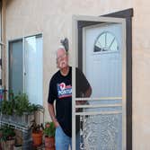 Swinging screen door