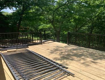 16 x 20 deck with black metal hand rails
