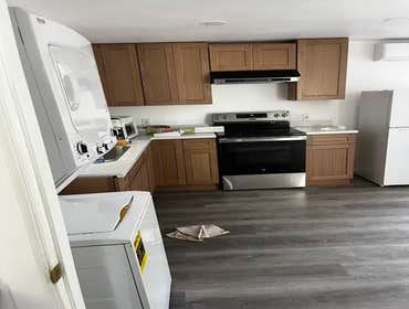 Photos by Pan Shi Construction Inc #1 Converted an existing garage into a fully functional Accessory Dwelling Unit (ADU), The project included framing 