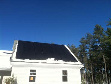 Photos by Plymouth Solar Energy #1 Ground Mounted hillside array