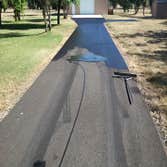 Apshalt Driveway Sealcoat This asphalt was allowed to cure for 1 year prior to sealcoating.