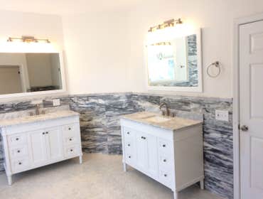 Photos by The Bathman #3 Full Bathroom remodel, replaced the shower with a new glass-enclosed shower, free-standing soaking tub, new tile floors, walls