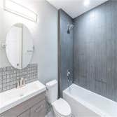 Photos by Rojas Acquisitions LLC #4 Redesigned house's footprint, added square footage to the overall living space, opened up kitchen/living area to ac