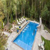 Fiberglass pool, concrete pool deck, landscape, raised platform