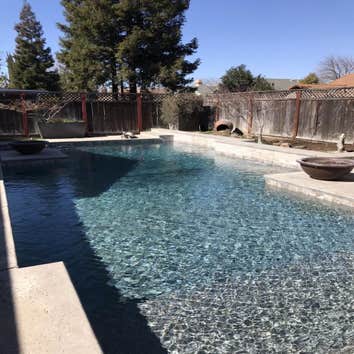 R O W CUSTOM ENTERPRISE INC DBA CUSTOM POOLS & REMODELING