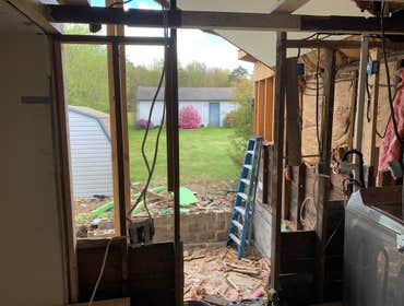 Photos by C.S Remodeling & Construction #1 Dust protection and entry to home protection temporary wall built to prevent anyone or anything from getting