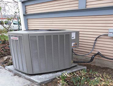 American Standard installation residential This is a recent installation of an American Standard heating and cooling system in a residential setting.
