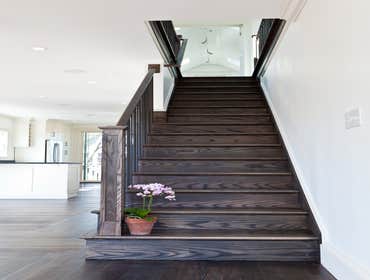 Rustic Meets Modern This remodel of a third floor and attic living space is located in Cambridge, MA. The house was designed to incorporate a rural vi
